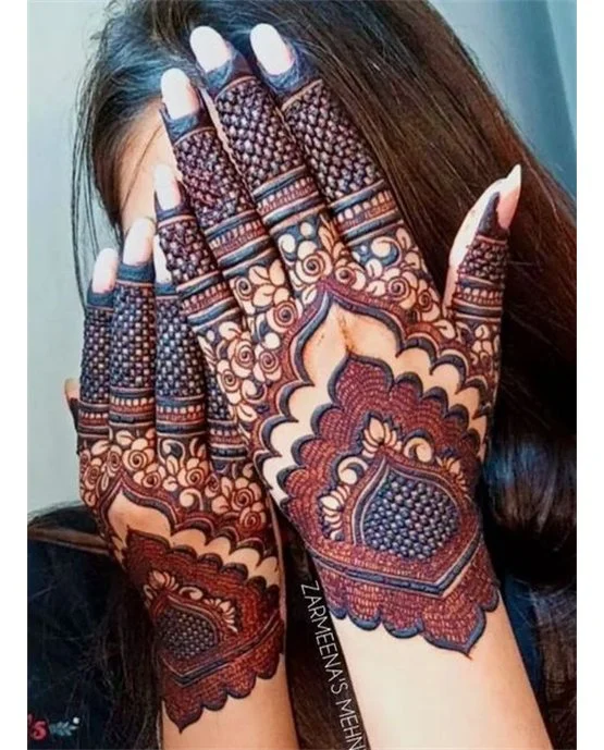 Creeper Inspired Rich Back Hand Mehndi Design Creeper Inspired Rich Back Hand Mehndi Design